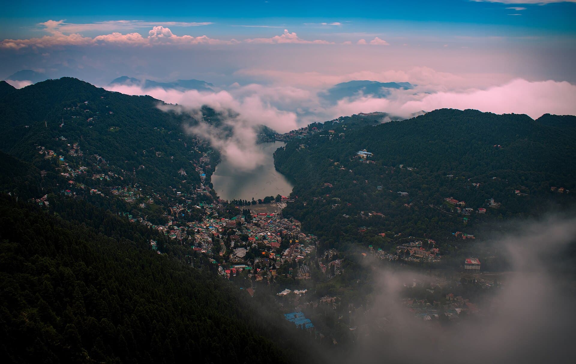 Nainital town and lake under monsoon clouds
