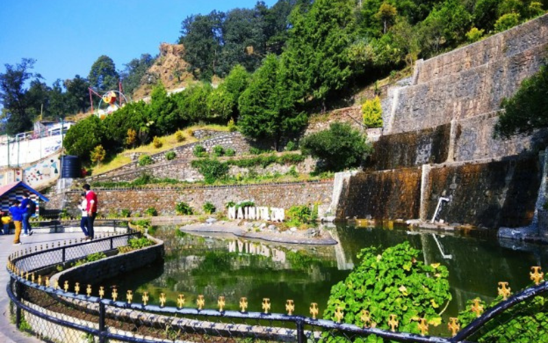 "A lush green enclosure at Nainital's high-altitude zoo"
