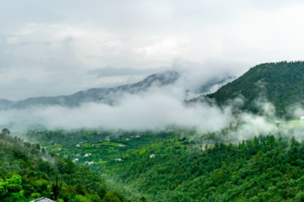 Misty mountains with clouds during monsoon Nainital.