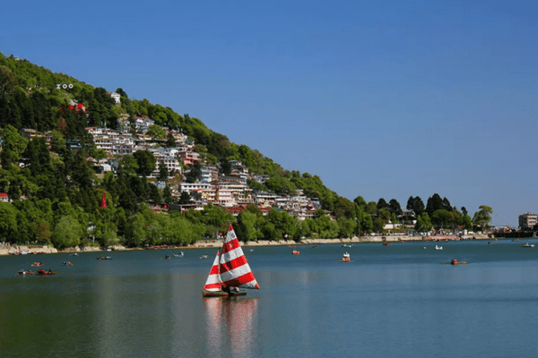 Boating in Nainital Lake with clear skies.
